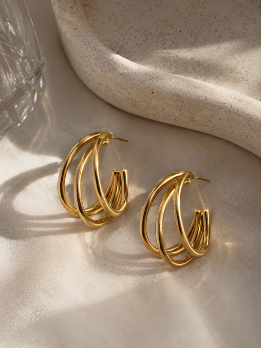 Maëlys Hoops – Gold Intertwined Creole Earrings